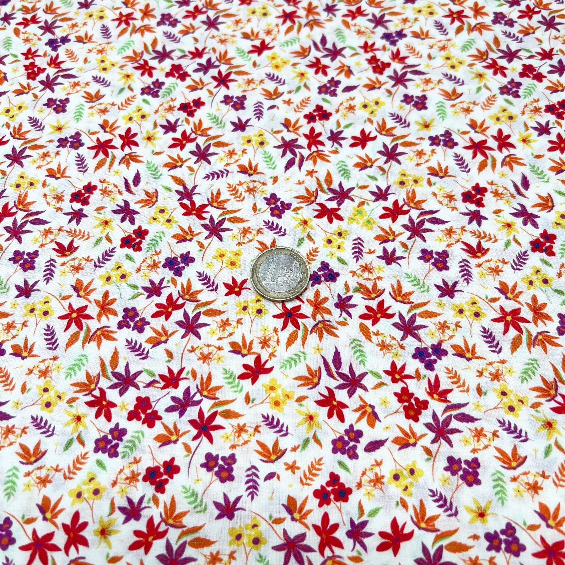 Tissu coton suisse style liberty fleurs hémérocalle orange et ocre
