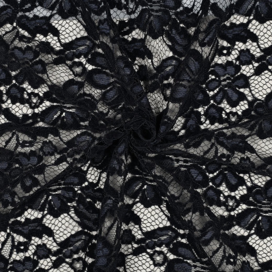Dentelle bleu marine fleurie drapée