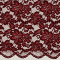 Tissu dentelle bordeaux fleurie à bord festonné