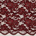 Tissu dentelle bordeaux fleurie à bord festonné