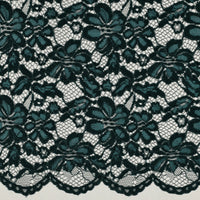 Tissu dentelle vert émeraude fleurie à bord festonné