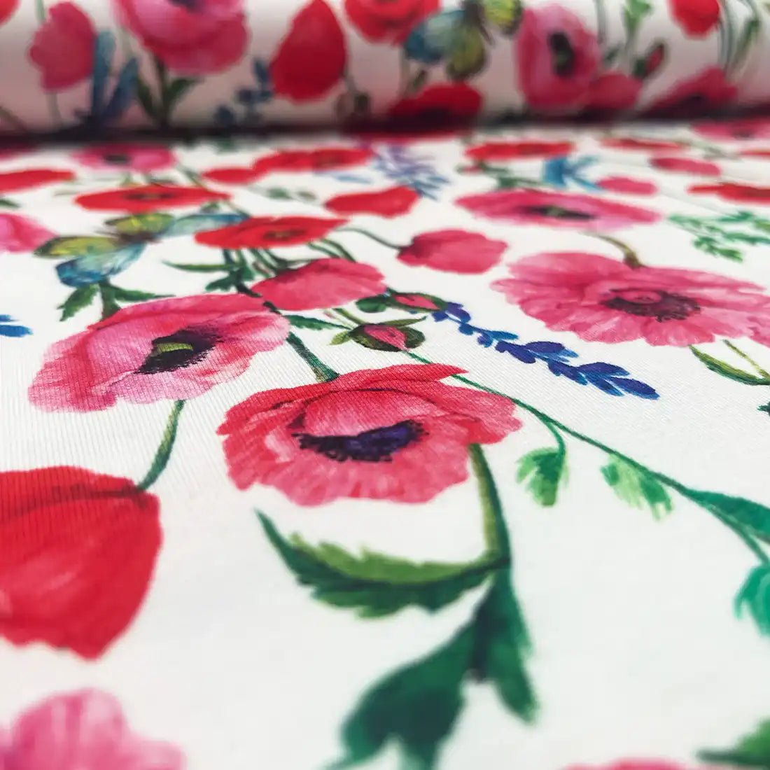 Tissu French Terry Coquelicots et Papillons Bleus – French Terry Sweat