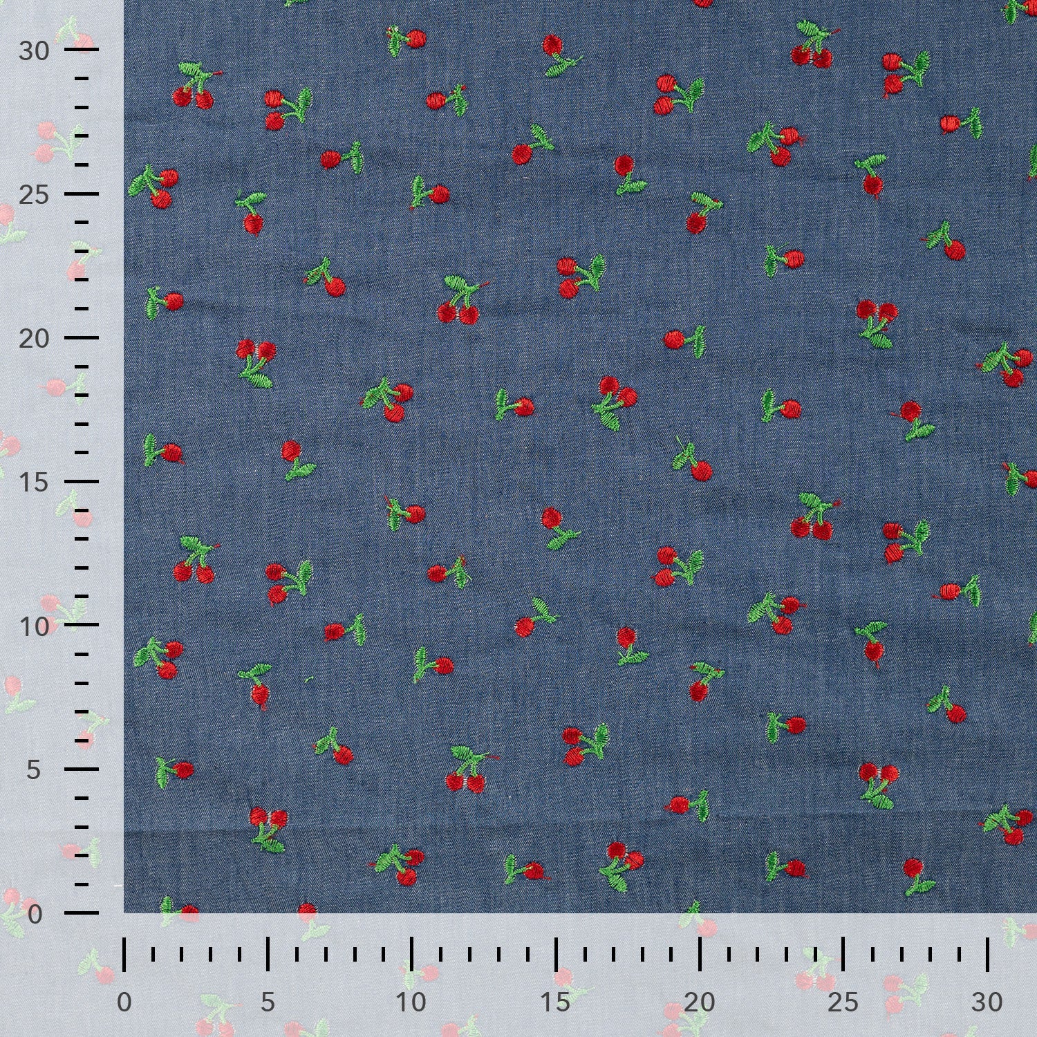 Tissu jean fin à broderie cerise