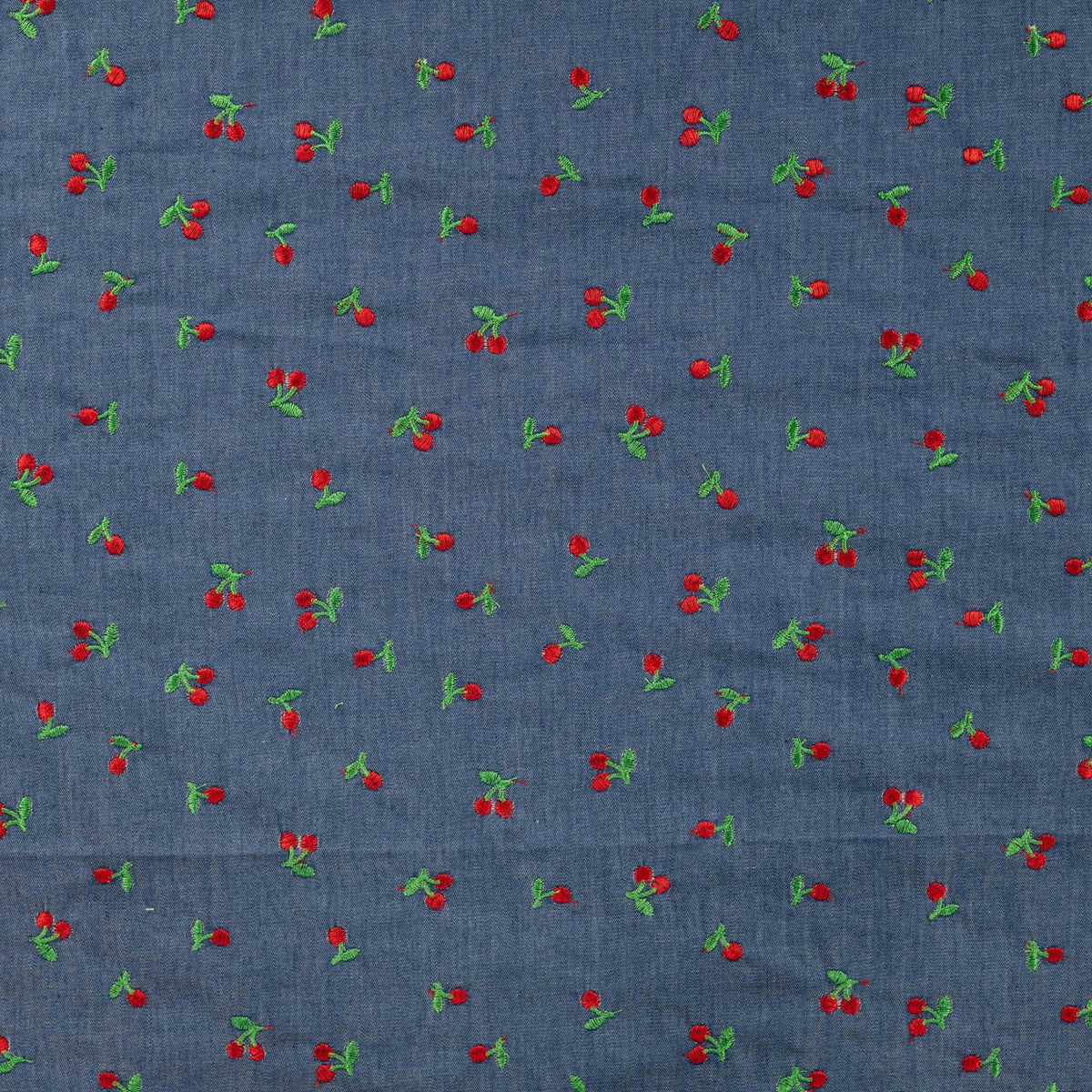 Tissu jean fin à broderie cerise