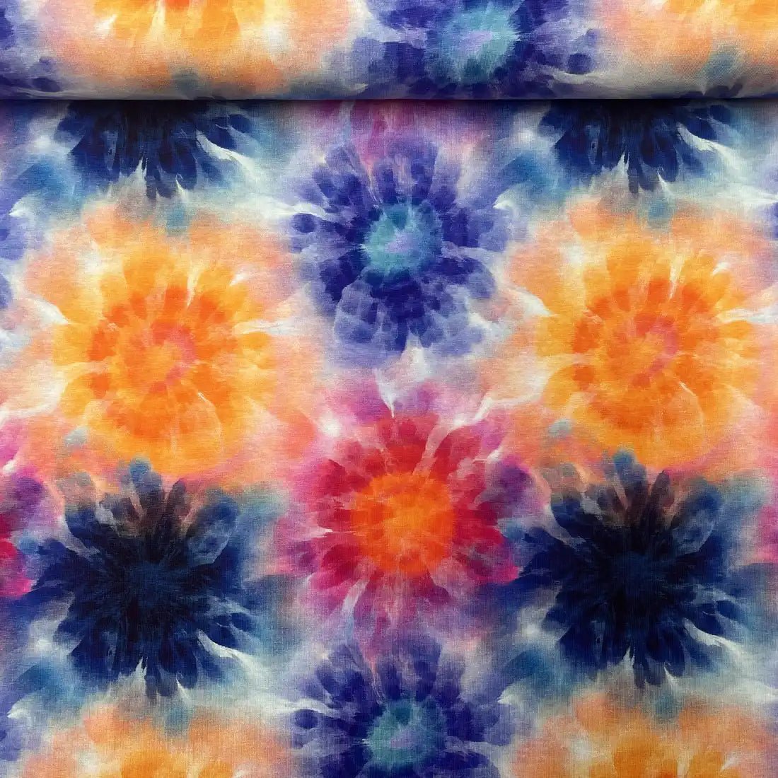 Tissu jersey coton imprimé fleurs tie and dye