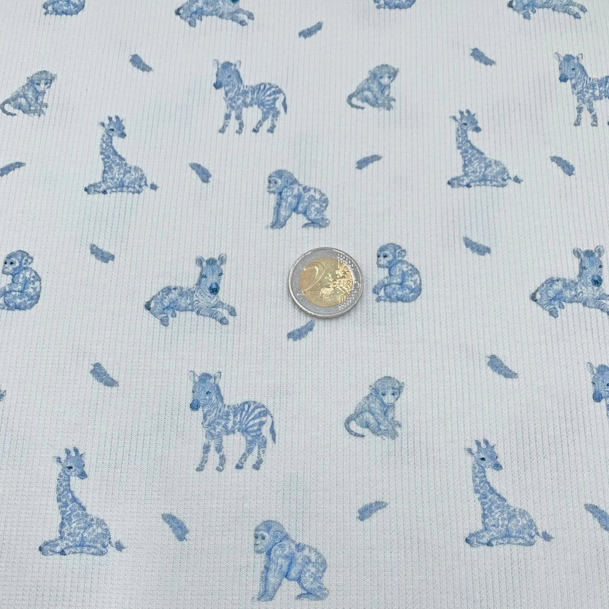 tissu-jersey-rib-animaux-et-plumes-taille-motif