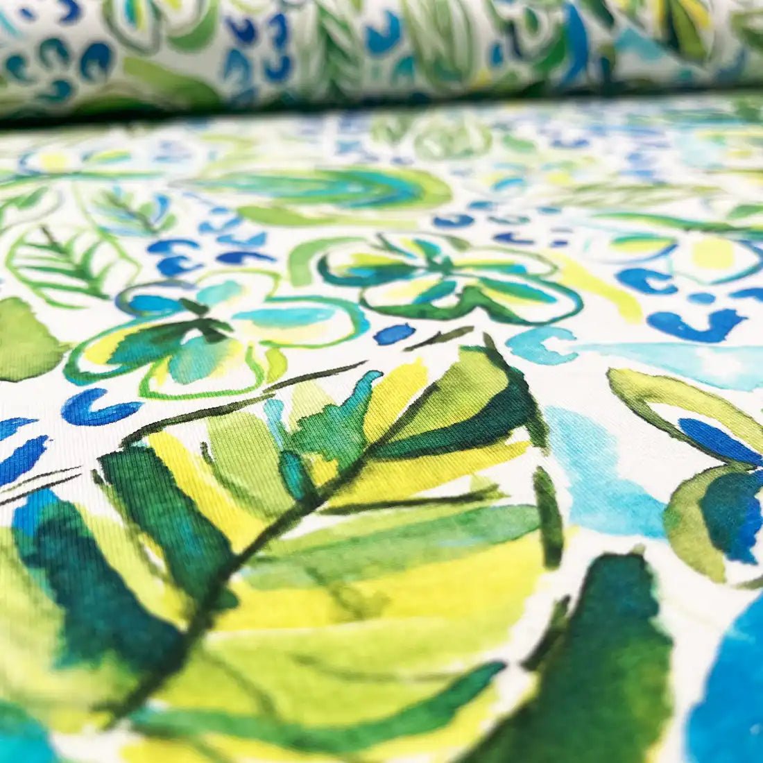 Tissu jersey floral vert et bleu
