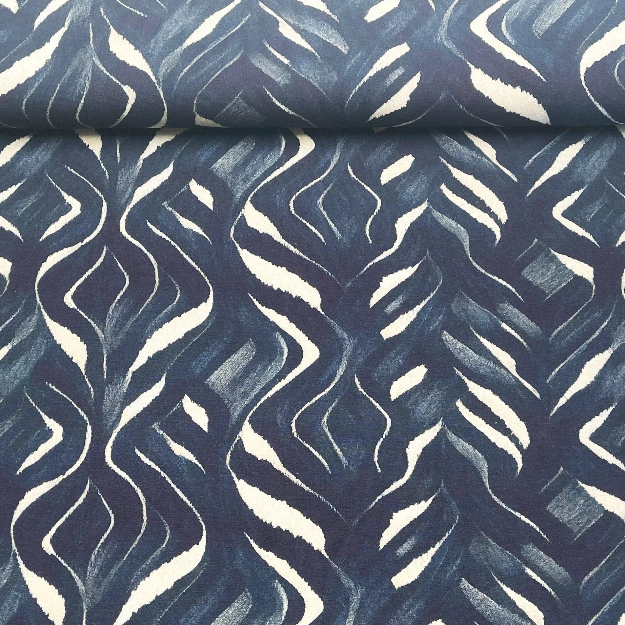 Tissu Jersey French Terry bleu nuit abstrait