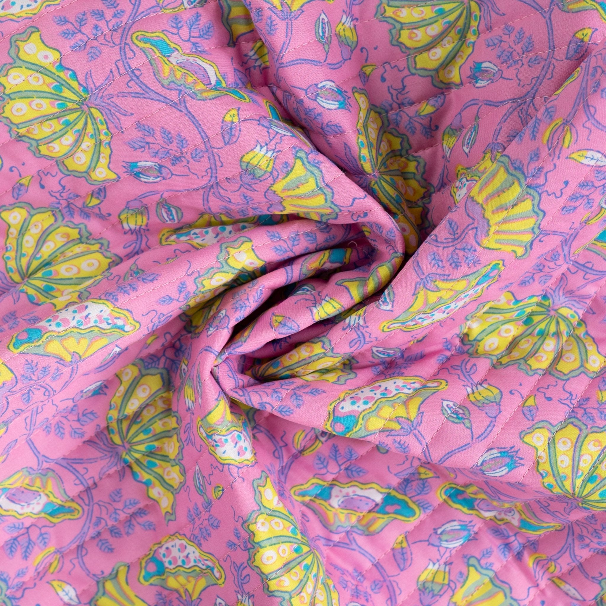 Tissu matelassé arabesque couture