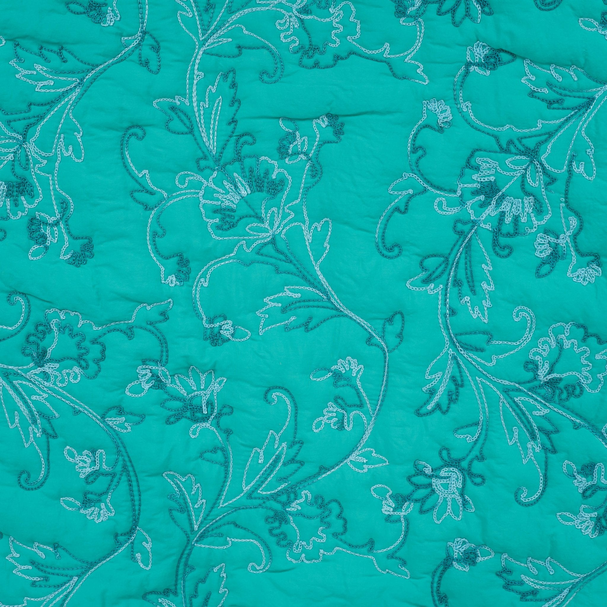Tissu matelassé turquoise