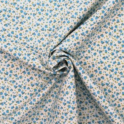 Tissu Popeline de coton Fleurs bleu ciel