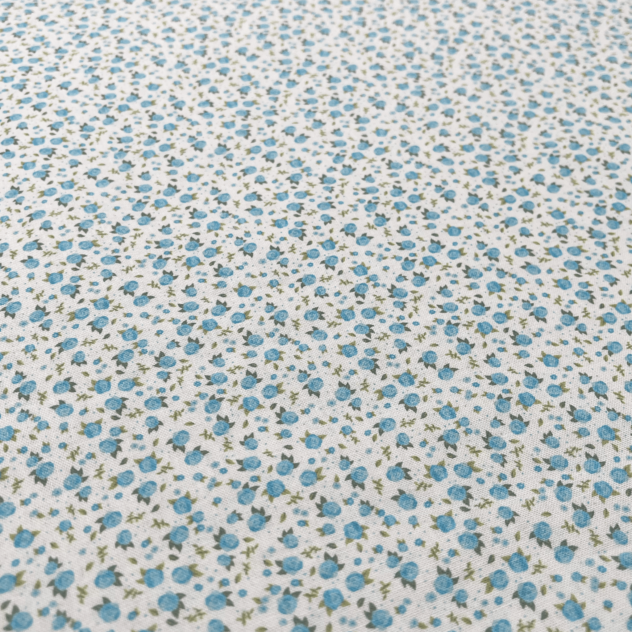 Tissu Popeline de coton mini fleurs bleu azur
