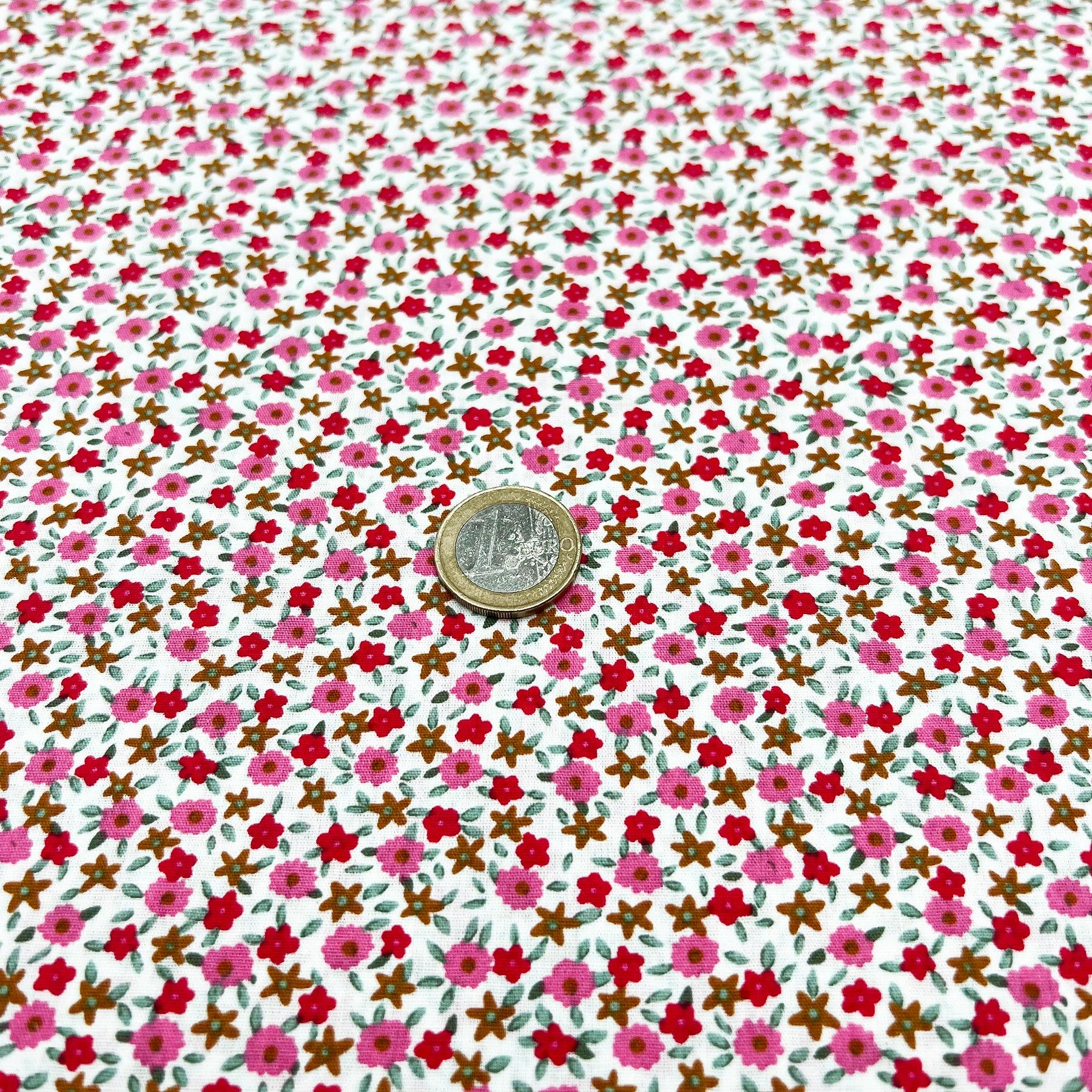 Tissu Popeline de coton petites fleurs roses et rouges