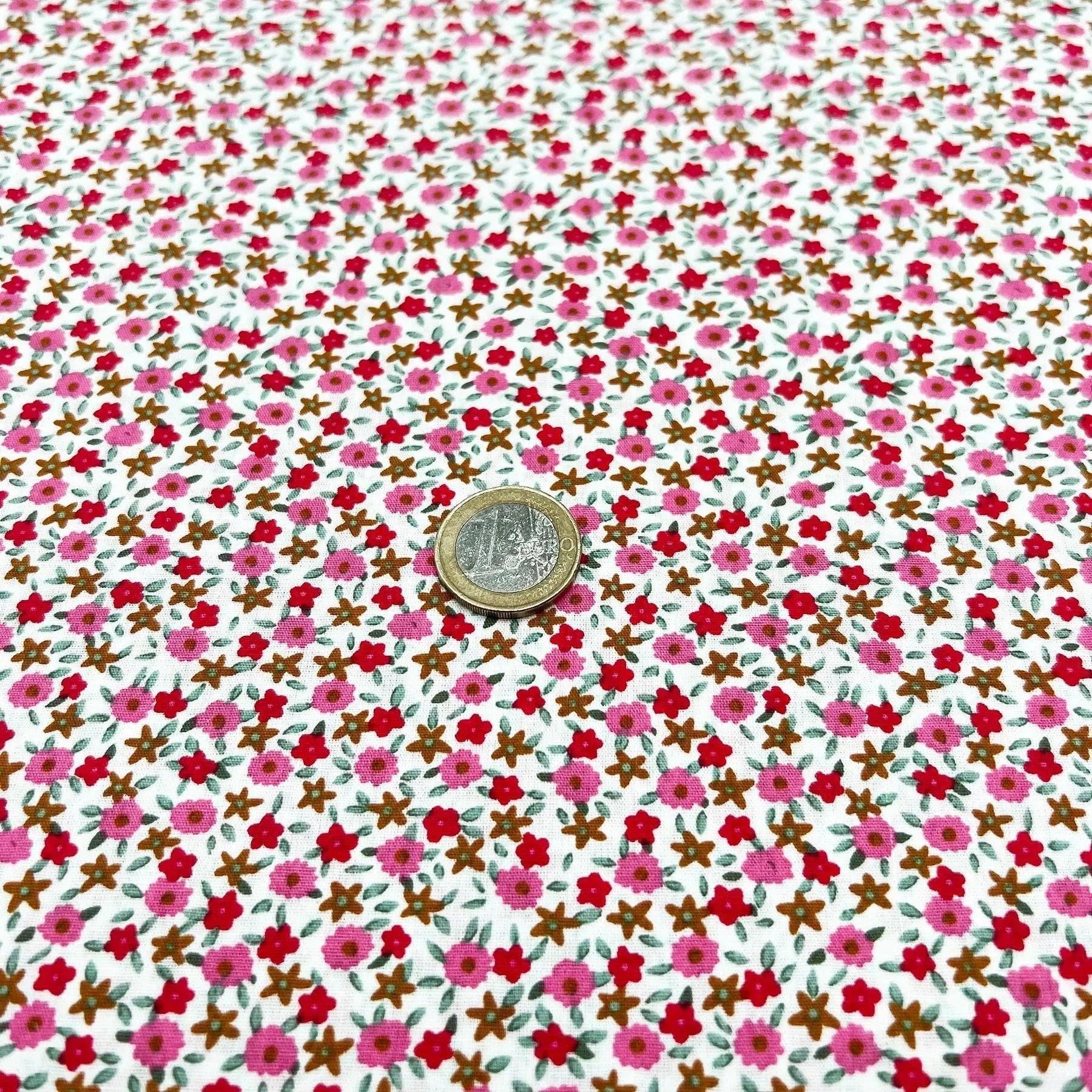 Tissu Popeline de coton petites fleurs roses et rouges