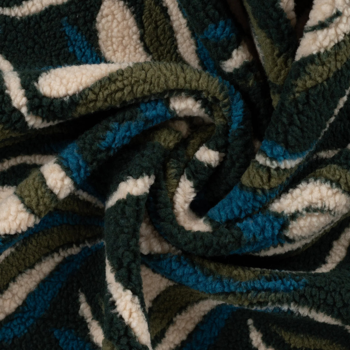 Tissu teddy jacquard tulipes pétrole drapé