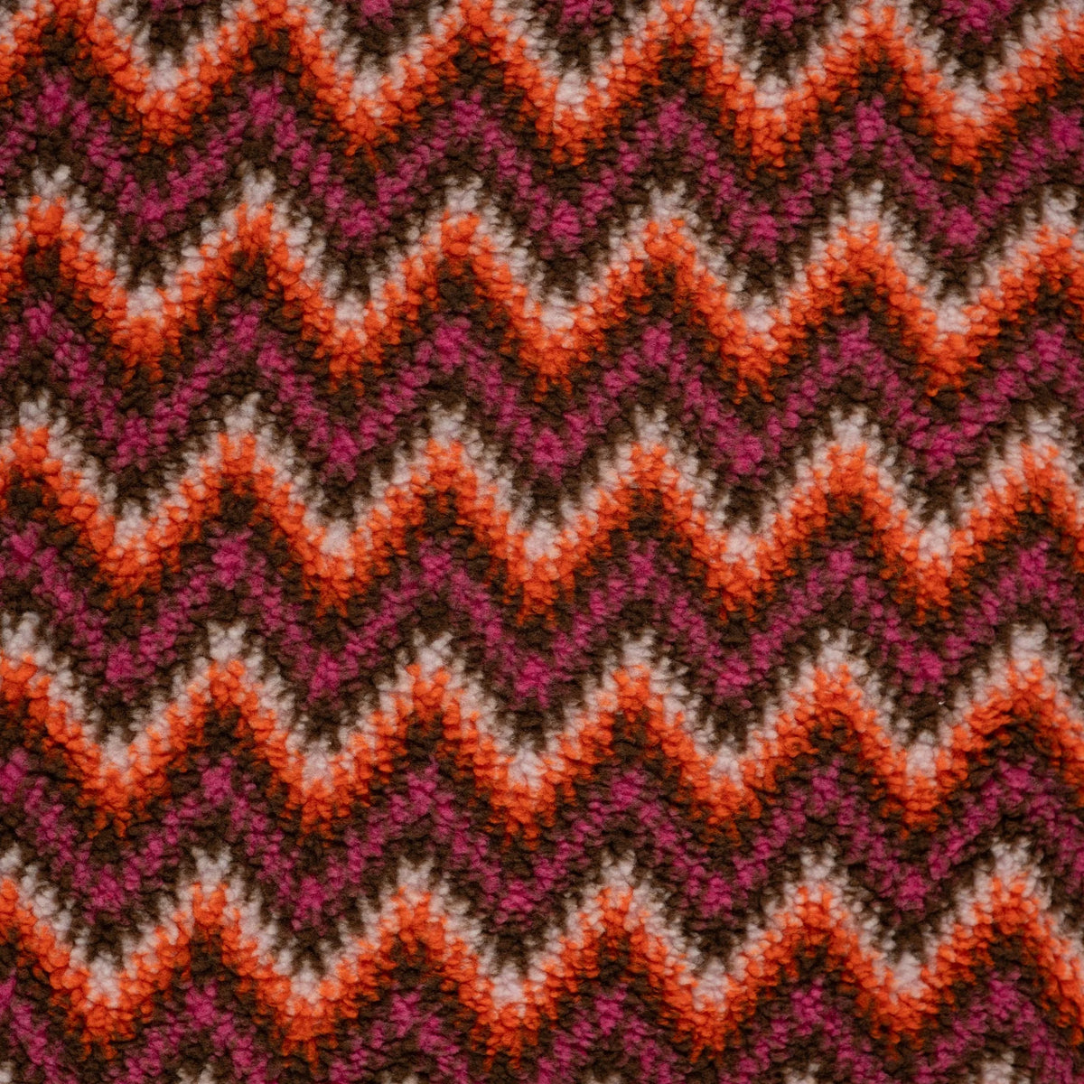 Endroit bouclé et envers jacquard du tissu teddy zigzag fuchsia