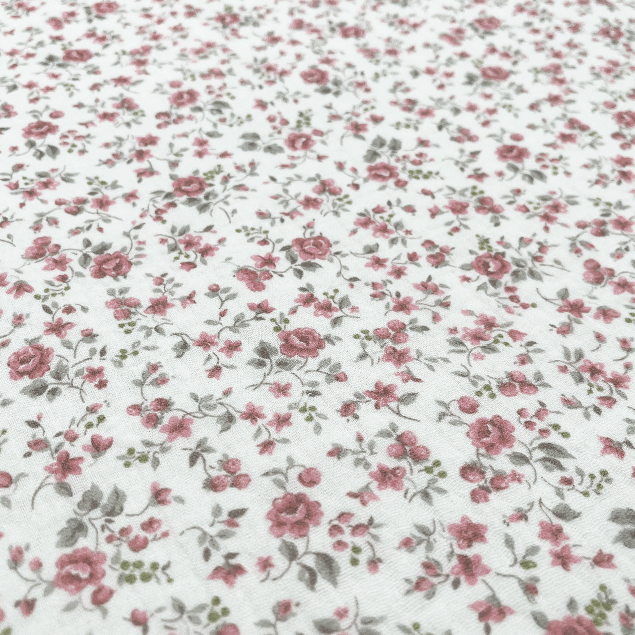 Tissus double gaze fleurs rose